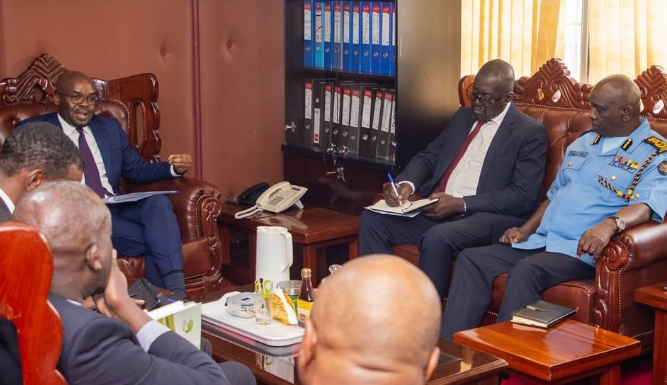 A file photo of PS Raymond Omollo and IG Douglas Kanja during a meeting with the JKIA Management,